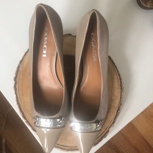 Coach tan leather pumps. Never Worn
